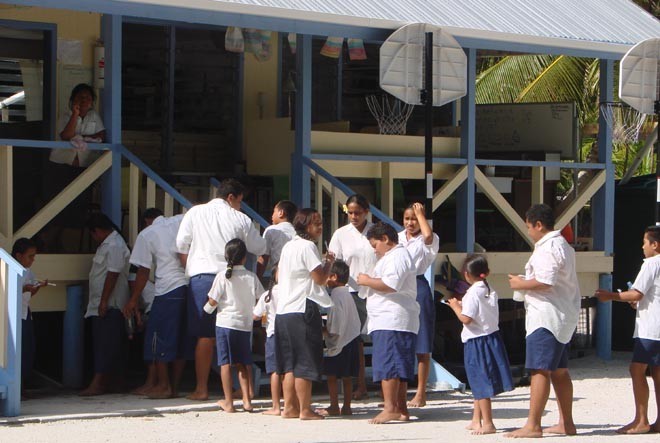 Children at Palmerston Atoll School line up to clean teeth after lunch © BW Media